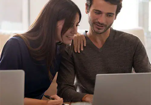 couple looking up solar reviews online.jpg