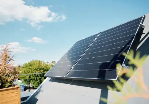 large solar panels on rooftop of modern comfortable house or cottage.jpg