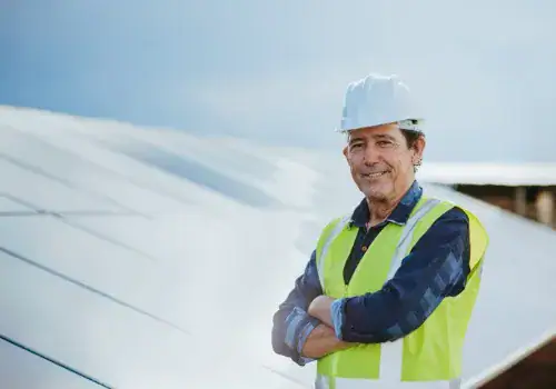 middle aged man working with solar panel solar energy picture id1303539040.jpg