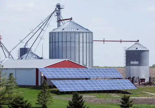 modern farm with grain elevator and solar panels picture id171221288.jpg