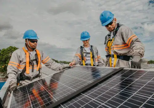 working on installing solar panels.jpg